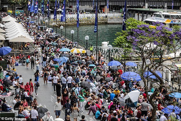 Free spots include some of the best places to view the Harbour Bridge, including Barangaroo Reserve, Bradfield Park and Mary Booth Reserve (pictured, revellers at Circular Quay ahead of the 2022 fireworks)