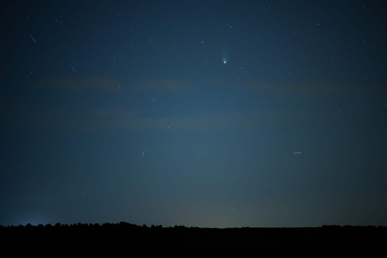 Comet 12P/Pons-Brooks known as the Devil Comet is seen over the horizon in Spain