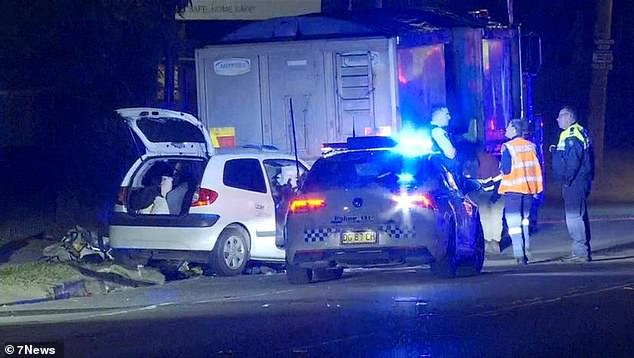 A woman and a young boy are fighting for life after the car they were travelling in smashed into a parked truck in St Marys, in Sydney's west