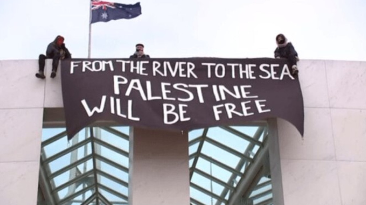 Pro-Palestine demonstrators have climbed onto the roof of Parliament House in Canberra. Picture: Sky News