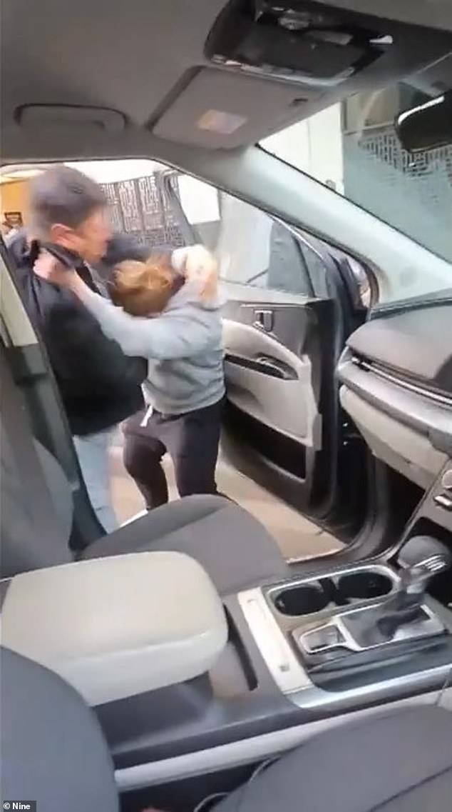 Mr Bui's 12-year-old son, who caught the brave confrontation on camera (pictured), also called tripe-0