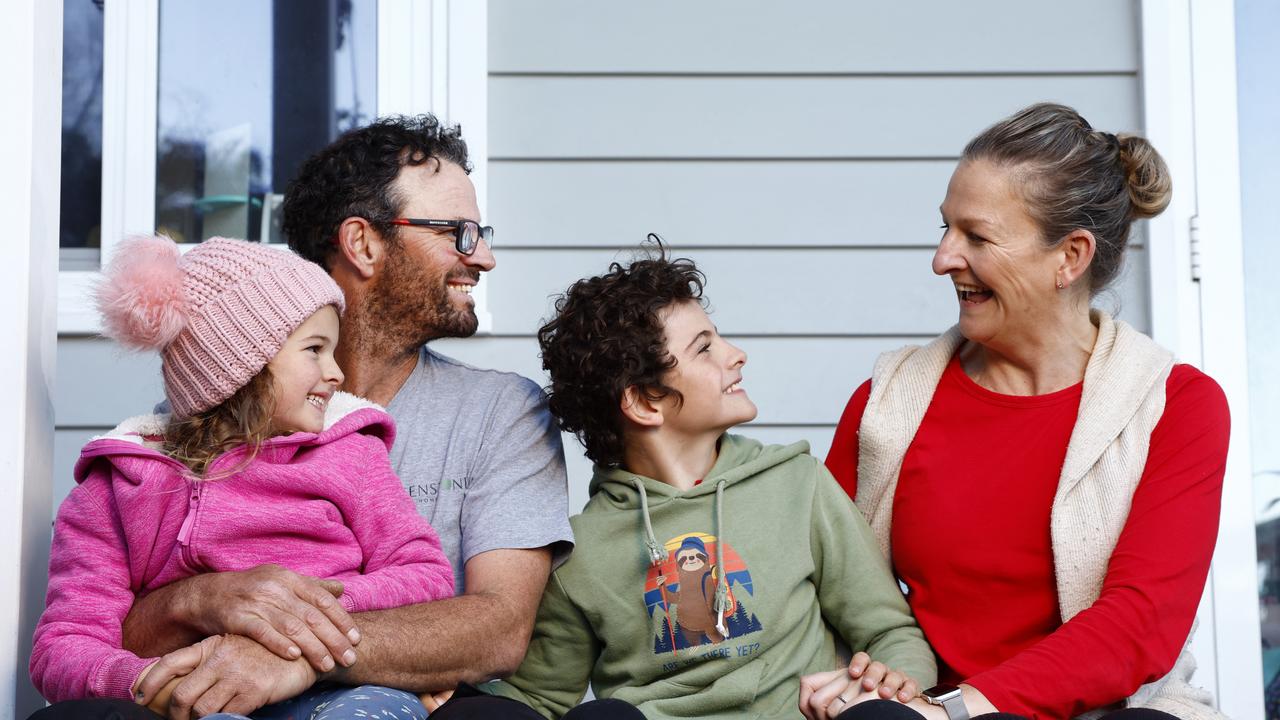 Andrew and Kathryn Farr with their children Izzy and Xavi. Mr Farr has been going to the snow for 30 years but he has decided to give Thredbo a pass this year because it is too expensive. Picture: Jonathan Ng