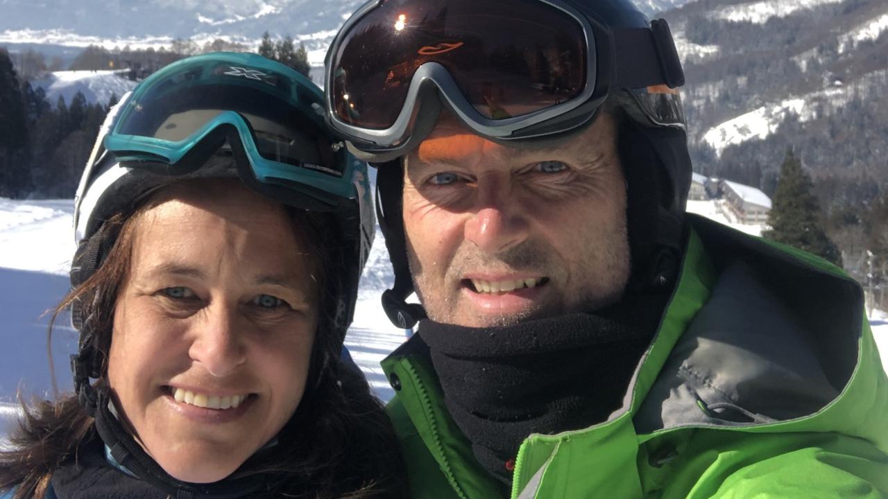 Tori and Christian Gibson, pictured in Nozawa, Japan, have made the decision to swap Thredbo and Perisher for Japan, where a one-day ski lift pass costs just $85.