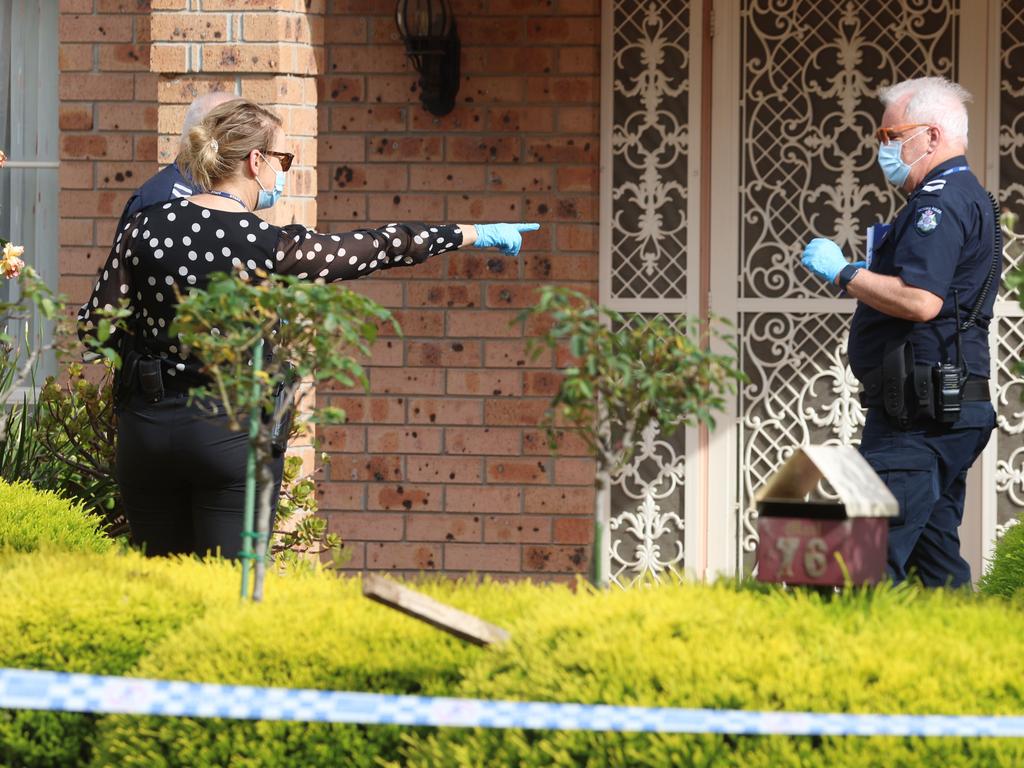 Detectives in Hoppers Crossing the morning after the stabbing. Picture: Brendan Beckett