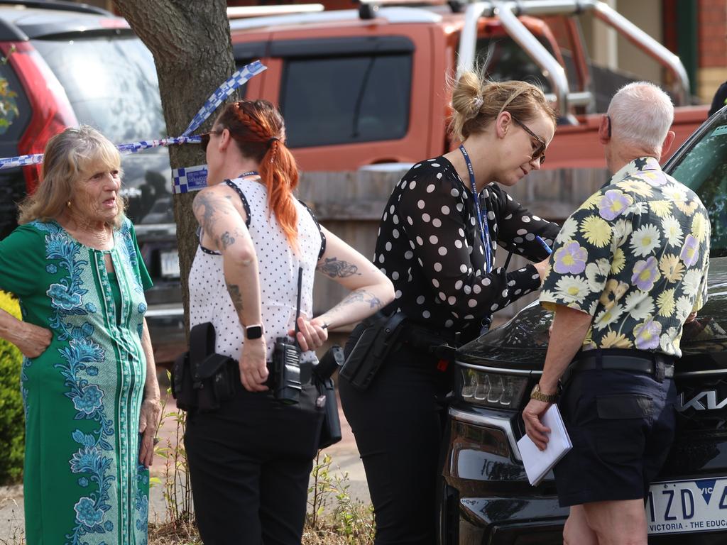 Police speak to people at the scene in Hoppers Crossing. Picture: Brendan Beckett