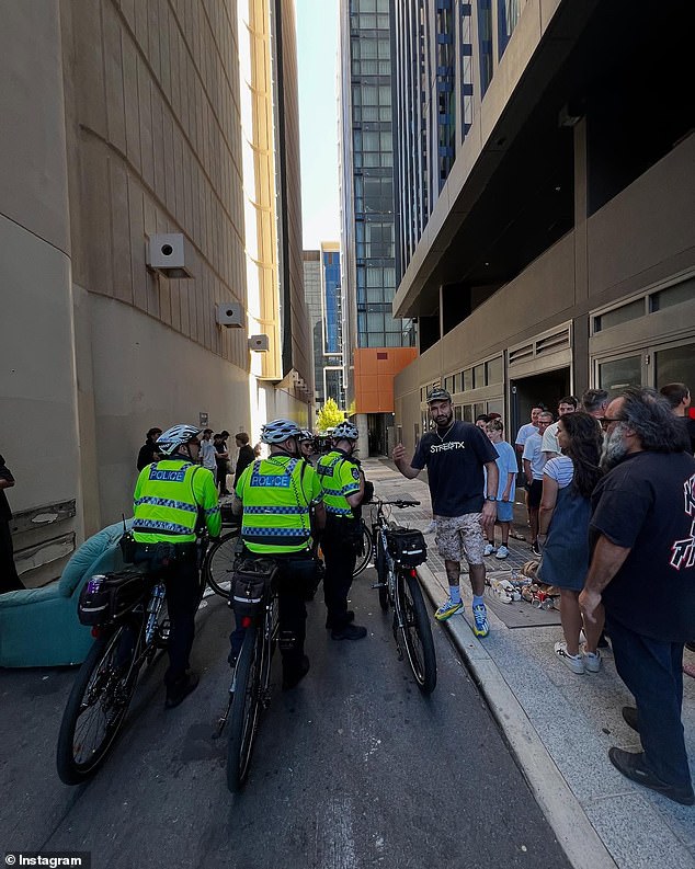 Police, pictured visiting the store, were 'fine' with the stampede, Mr Bradshaw said