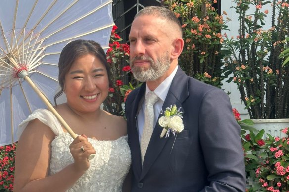 Matthew Radalj, who spent nearly five years in jail in China on what he says were false robbery charges, with wife Mimi. They married in January.
