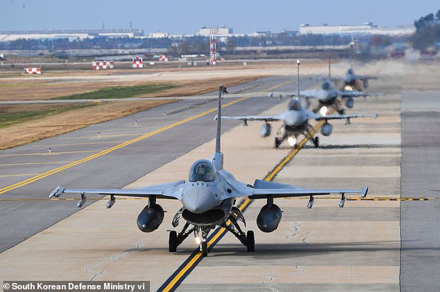 South Korean Air Force KF-16 fighter jets are seen on the runway in Gunsan