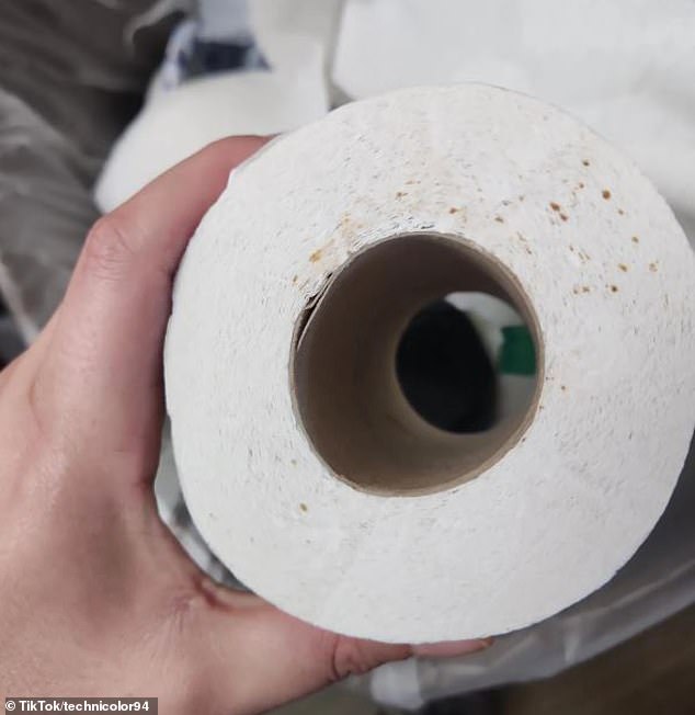 The small marks on toilet paper could be specks of blood from dirty needles used for injecting illegal drugs