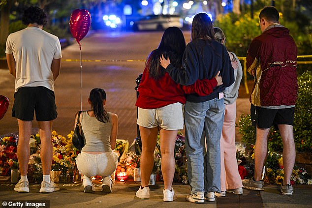 Students gathered to pay their respects to the two lives lost and six injured