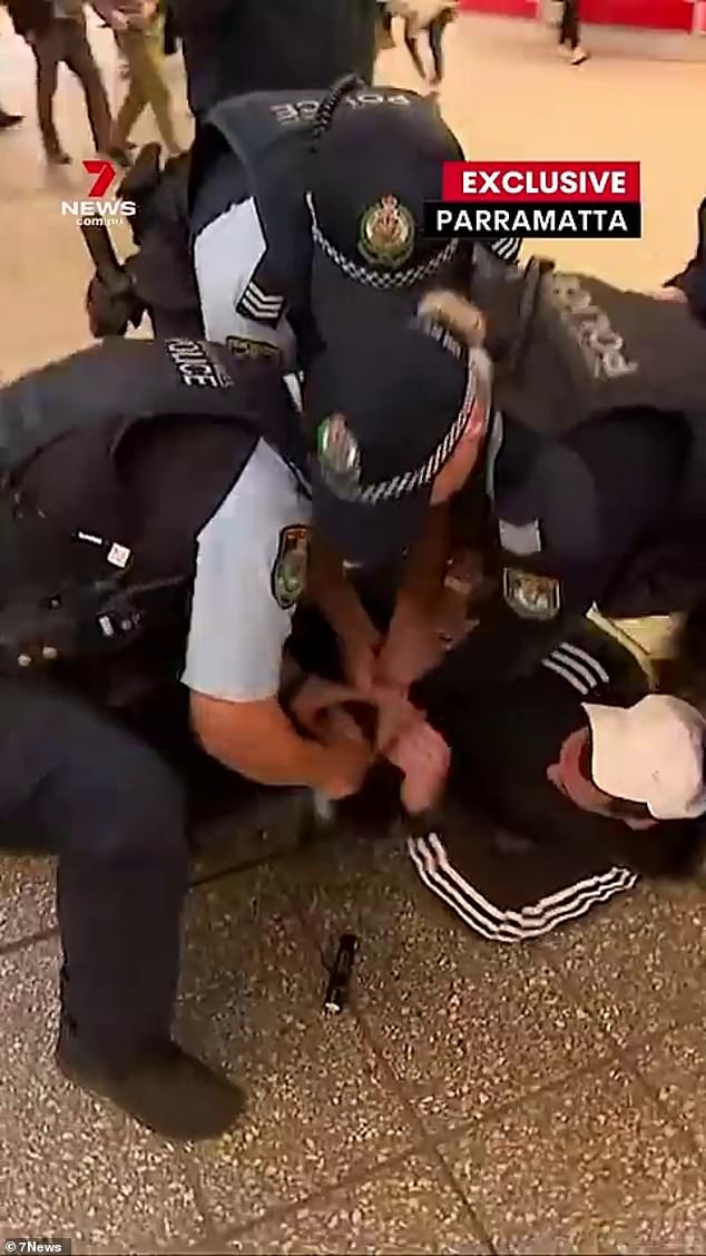Footage obtained by 7News showed the man striding through the crowded Parramatta station, meat cleaver in hand, as bystanders watched on in shock