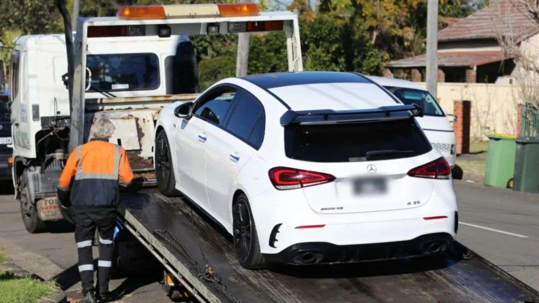 A tow truck taking away a Mercedes. Picture: NSW Police