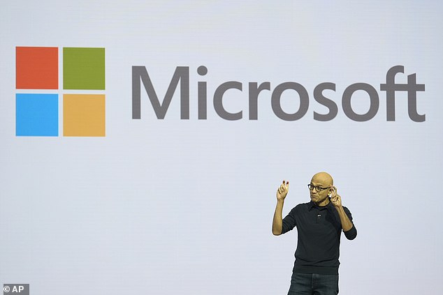 Microsoft is planning to cut thousands of jobs as it ramps up investments in artificial intelligence (Pictured: CEO Satya Nadella)