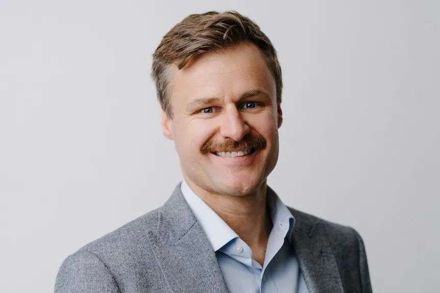 A man in a suit.