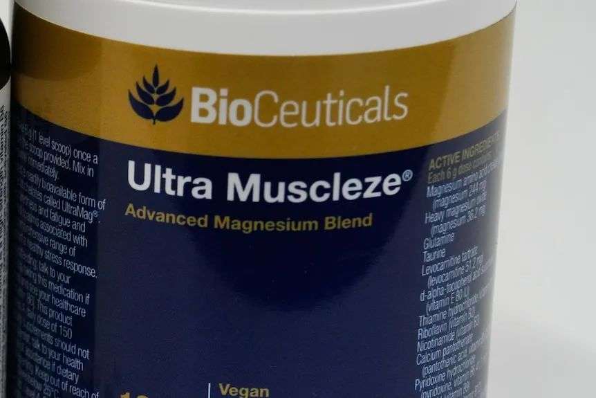 Three bottles of vitamin supplements