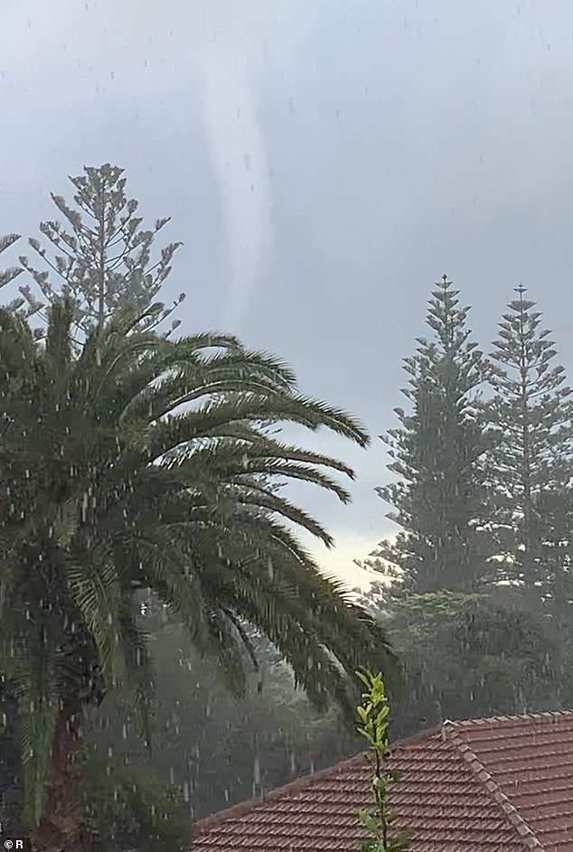 The freak tornado (pictured) tore through the coastal suburb of City Beach in Perth