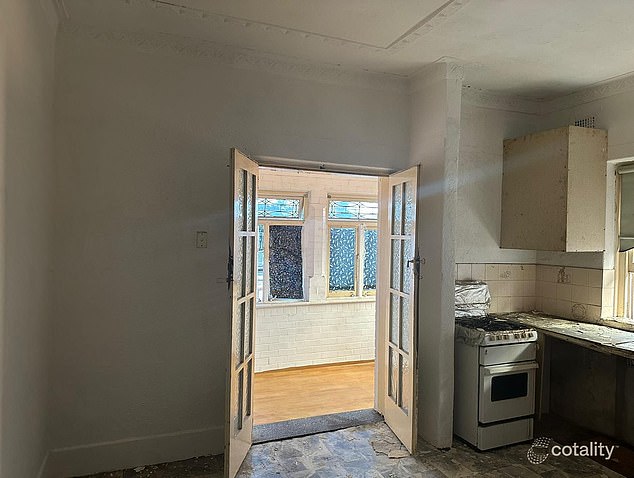 The kitchen in the listing is missing draws, and has exposed pipes