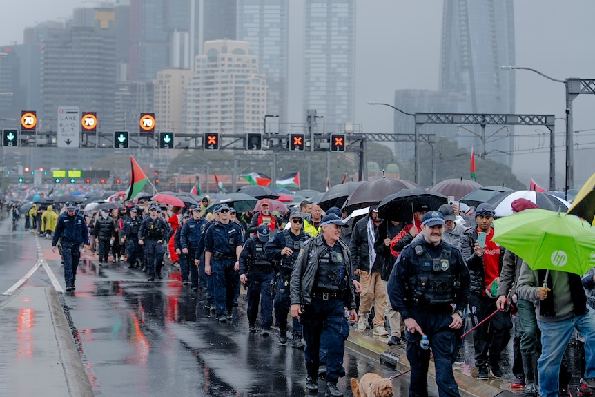 NSW Police line the march