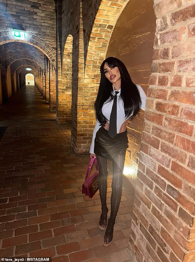 Cosmetic surgery enthusiast Tara Jayne McConachy, 35, (pictured) gave her followers a rare glimpse at her latest look this week, uploading a photo of herself posing at Mitchelton Wines in Victoria