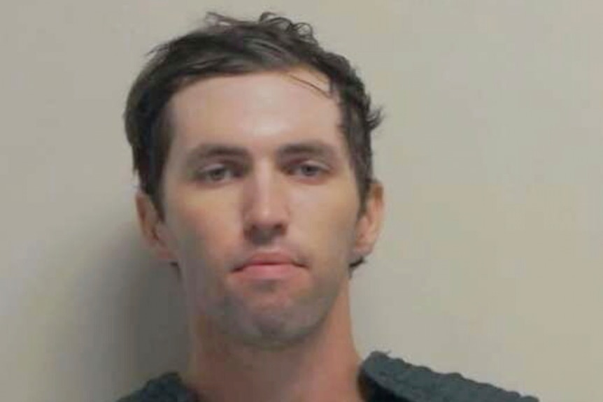 A mugshot of Tyler Robinson