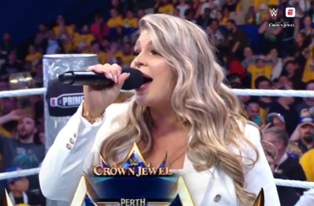 Pictured: Sophie Foster performs the Star-Spangled Banner at the WWE Crown Jewel event in Perth, where the anthem was greeted with loud booing by Aussie fans