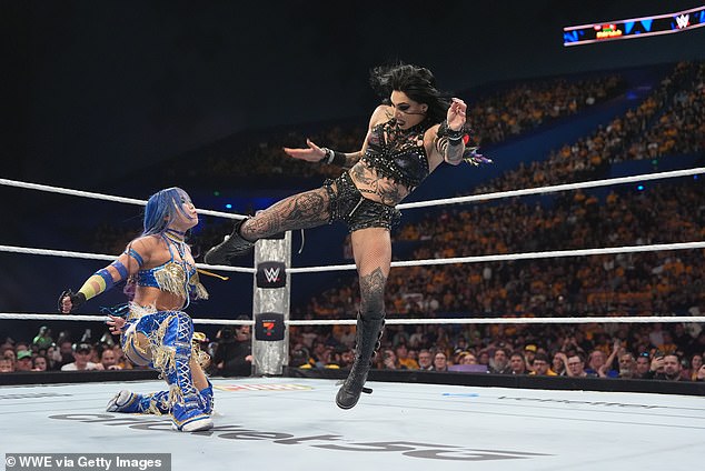 Australia's Rhea Ripley (right) is pictured in action against Kairi Sane in Perth