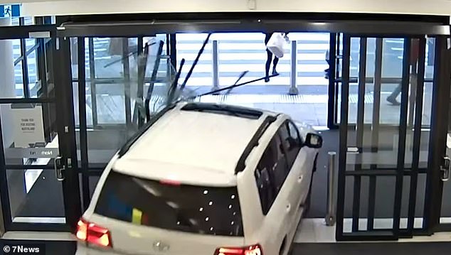 Shoppers flee as the car rampages through Northland Shopping Centre in June