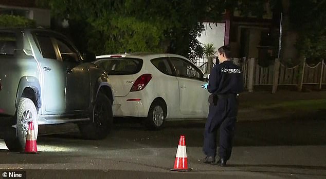 Forensic officers spent the night at the crime scene in Riverwood