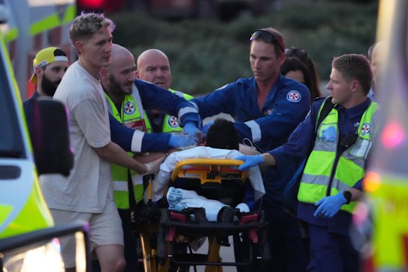 Emergency workers at the scene of the Bondi Beach shooting.