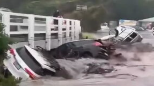 Cars collect in floodwaters at Wye River.