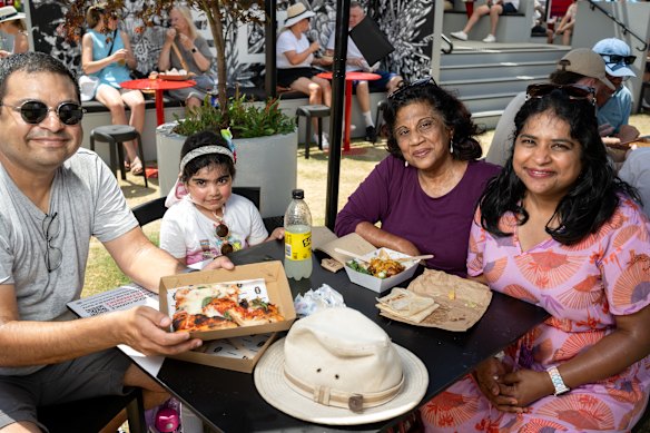 Tarushka Moniz (right) and family members (from left) Srushti Ambekallu, daughter Anita and Fatima Moniz with the food they bought at the Australian Open.