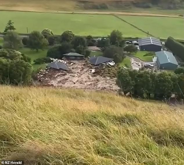The slip also destroyed several homes and seriously injured one other person, with dramatic footage captured by the NZ Herald showing properties submerged in mud