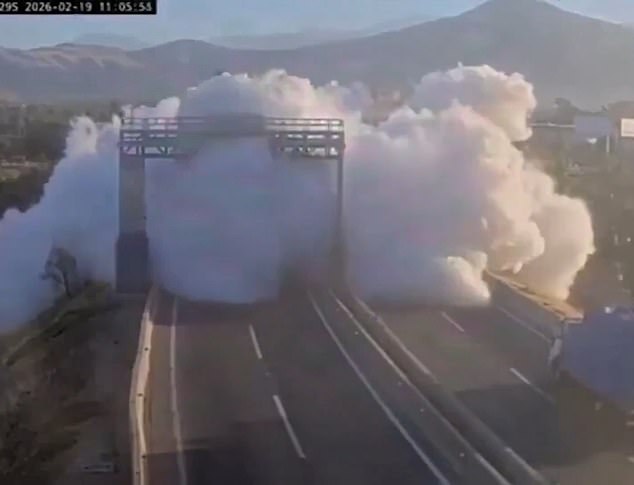 A truck transporting liquid gas overturns and explodes in Santiago, Chile, spreading a smoke-like gas cloud across a highway in Renca
