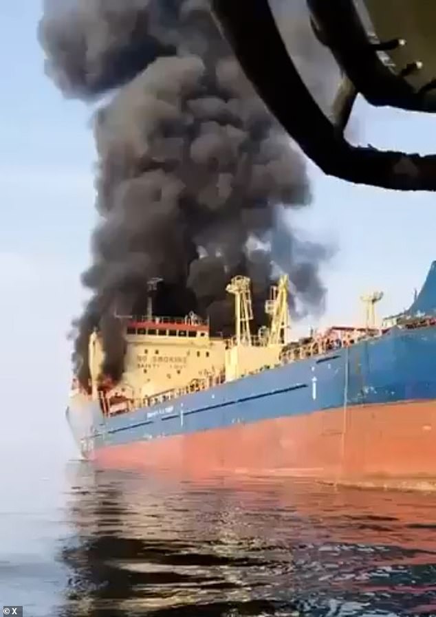 Global oil supplies rely heavily on the Strait of Hormuz. Iranian state television on Sunday said an oil tanker was sinking after it was struck while attempting to pass through (pictured)