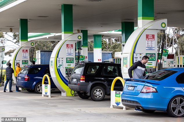 Crude prices surged up to 13 per cent on Monday as conflict in Iran threatened to disrupt wider Middle Eastern oil supplies (pictured, a petrol station in Melbourne)
