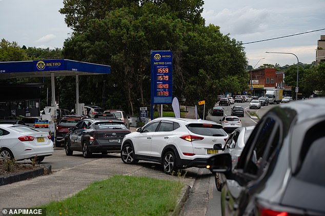 Crude oil surged to its highest level since Russia invaded Ukraine in 2022, with prices surging as high as USD$110 a barrel (pictured, drivers queuing at a service station in Sydney last Tuesday)