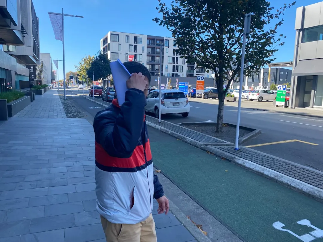 Rongjian Feng outside the Christchurch District Court where he was sentenced for wilful ill-treatment of an animal. Photo / Al Williams