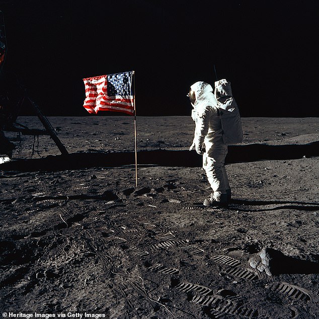 Conspiracy theorists have seized on the remark as supposed evidence that earlier lunar missions never happened. Pictured is Buzz Aldrin standing on the moon in 1969