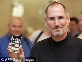 Steve Jobs, then-chief executive officer of Apple, with the iPhone
