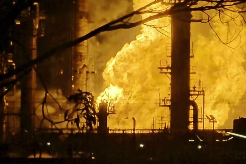 Fire rages through an oil refinery in Geelong.