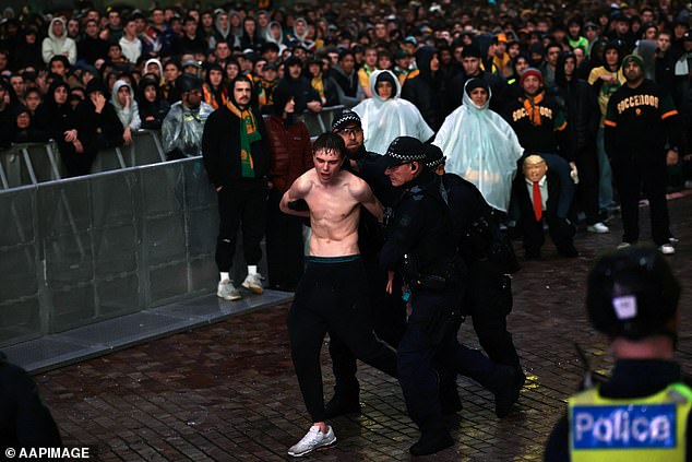 Police confirmed two people were arrested after flares were set off during the build-up to the World Cup fixture